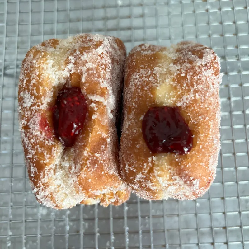 Brioche donut filled with raspberry-cardamom jam