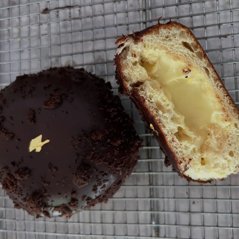 Westchester Cream donut with chocolate ganache and gold leaf